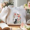 Embroidered Black Cat Chasing Butterfly Meadow Sweatshirt , Flower With Cat Hoodie, Black Cat And Wildflowers Sweatshirt, Cat Lover Shirt