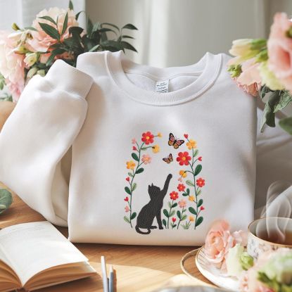 Picture of Embroidered Black Cat Chasing Butterfly Meadow Sweatshirt , Flower With Cat Hoodie, Black Cat And Wildflowers Sweatshirt, Cat Lover Shirt