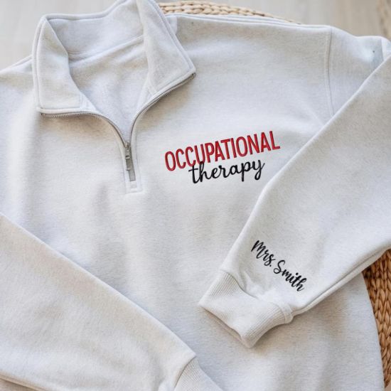 Picture of Embroidered Occupational Therapy Quarter Zip With Name On Sleeve, OT or COTA grad Gift, Occupational Therapy Quarter Zip, OTA Apparel