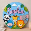 Picture of Personalized Safari Name Sign, Custom Jungle Animal Door Hanger, Kids Room Nursery Wall Decor, Baby Girl Nursery Gift, Round Wood Sign Hang