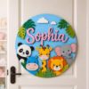Picture of Personalized Safari Name Sign, Custom Jungle Animal Door Hanger, Kids Room Nursery Wall Decor, Baby Girl Nursery Gift, Round Wood Sign Hang