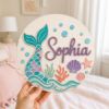 Picture of Personalized Mermaid Tail Name Sign, Custom Girls Room Door Hanger, Under The Sea Nursery Wall Decor, Ocean Baby Gift, Round Wood Sign