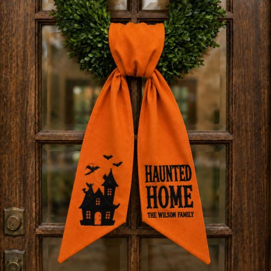Picture of Personalized Haunted Home Wreath Sash Bow, Custom Family Name Halloween Wreath Bow, Embroidered Haunted House Door Hanger, Spooky Door Decor