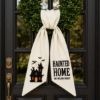Picture of Personalized Haunted Home Wreath Sash Bow, Custom Family Name Halloween Wreath Bow, Embroidered Haunted House Door Hanger, Spooky Door Decor