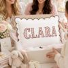 Picture of Personalized Rose Buds Applique Name Pillow, Custom Embroidered Scalloped Nursery Cushion, Grandmillennial Decor, Baby Shower Gift
