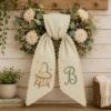 Picture of Personalized Baby Wreath Sash, Custom Embroidered Bassinet Monogram Sash, New Baby Door Decor, Nursery Wreath Bow, Baby Shower Gift