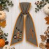 Picture of Personalized Witchy Halloween Sash, Potion Bottle Embroidered Monogram Sash, Black Gingham Spooky Season Accessory, Custom Halloween Gift
