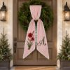 Picture of Personalized Christmas Sash, Embroidered Amaryllis Monogram Sash, Red Stripe Holiday Accessory, Custom Initial Christmas Gift Sash Wreath