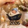 Picture of Baby First Christmas Ornament, Personalized Newborn Keepsake, Custom Name Sleigh Ornament, Baby Holiday Gift, Christmas Tree Decor 2026