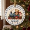 Picture of Personalized Baby First Christmas Ornament 2026, Custom Name Teddy Bear Train Ceramic Ornament, Baby Boy 1st Christmas Keepsake Gift